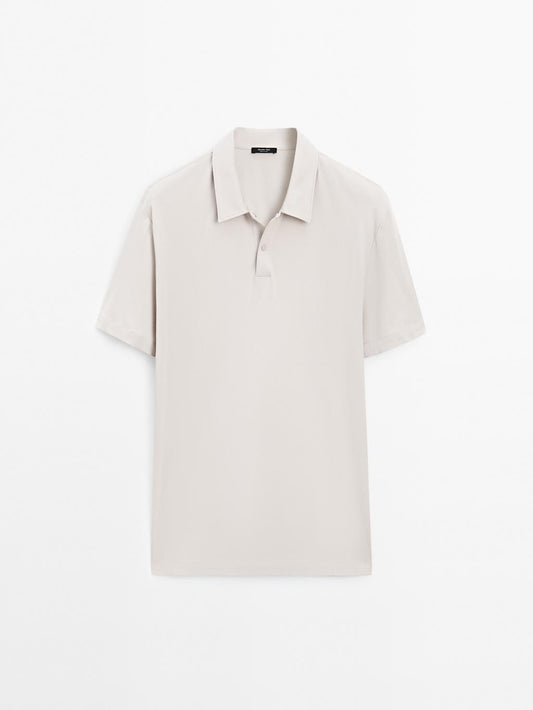 Short sleeve polo shirt with snap-button placket