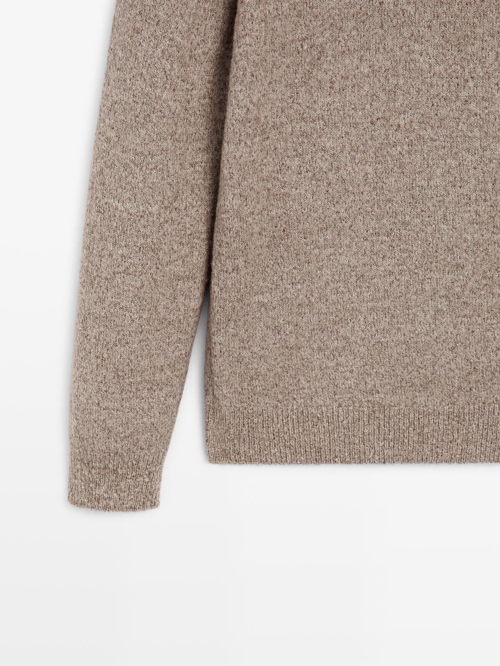 Flecked crew neck knit sweater