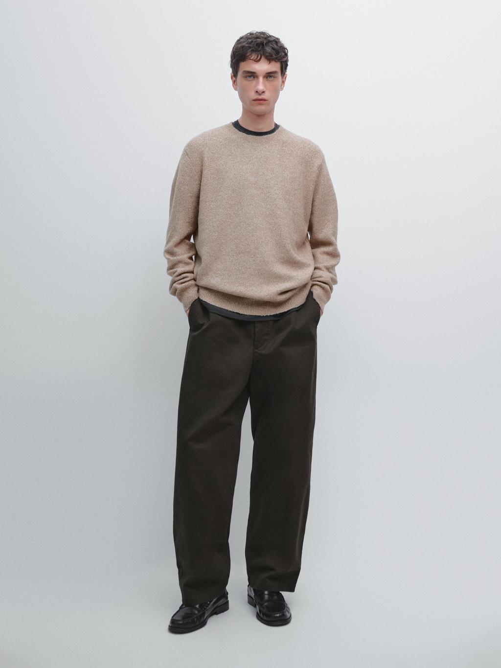 Flecked crew neck knit sweater