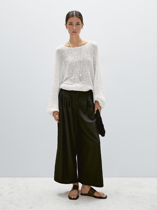 Flowing palazzo trousers with darts