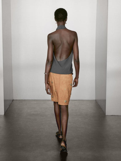 Suede leather skirt with rhinestone detail