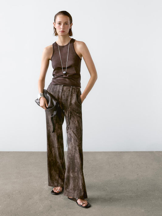 Round neck top with shimmery detail