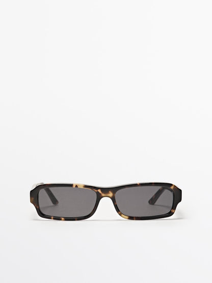 Elongated sunglasses