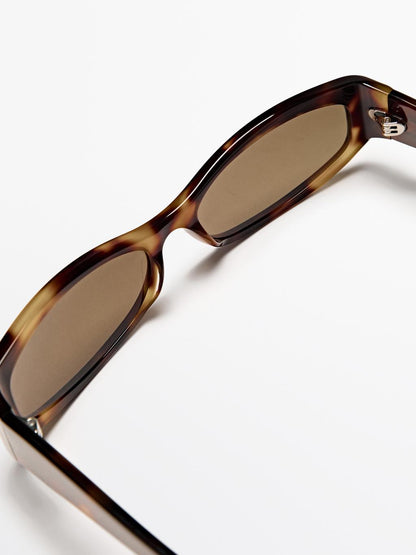 Small elongated sunglasses