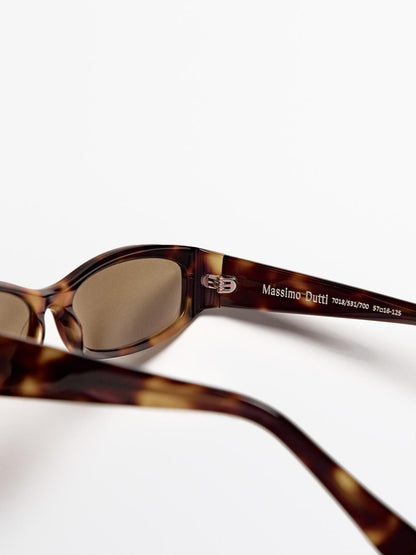 Small elongated sunglasses